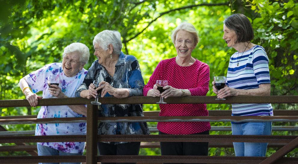 Seniors enjoy one another's company on an 80-acre campus.