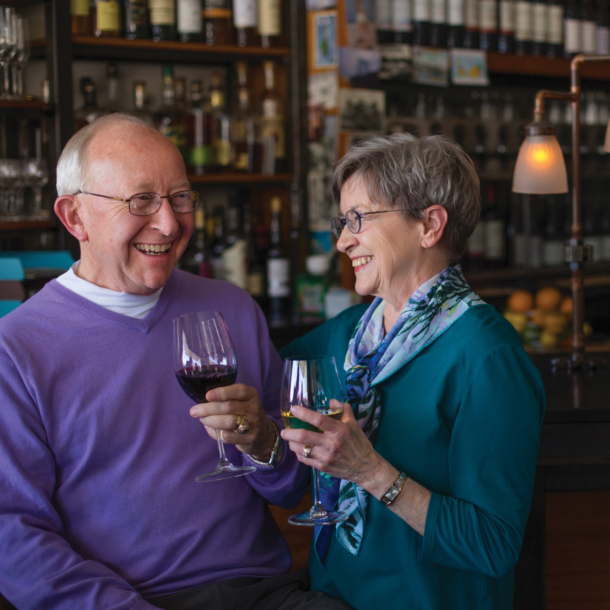Senior couple enjoying wine together